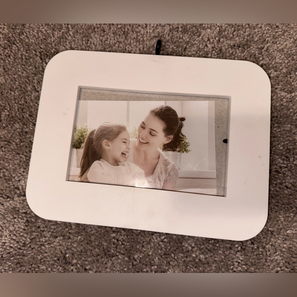 Small white picture frame 🖼️ with hook